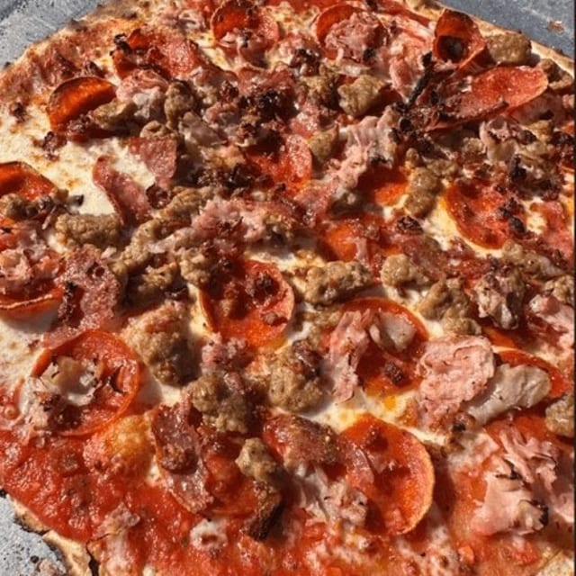 The Mighty Meaty Pizza.