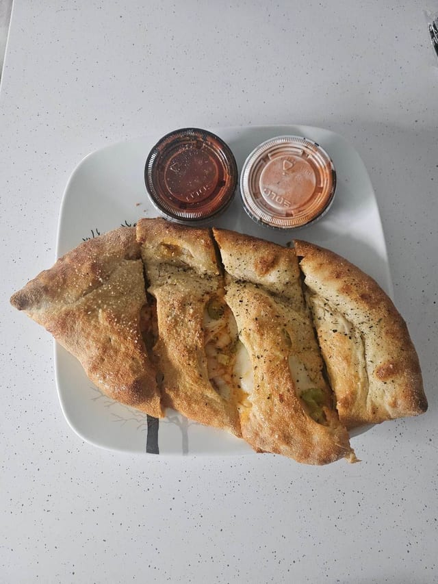 BUFFALO CHICKEN CALZONE.