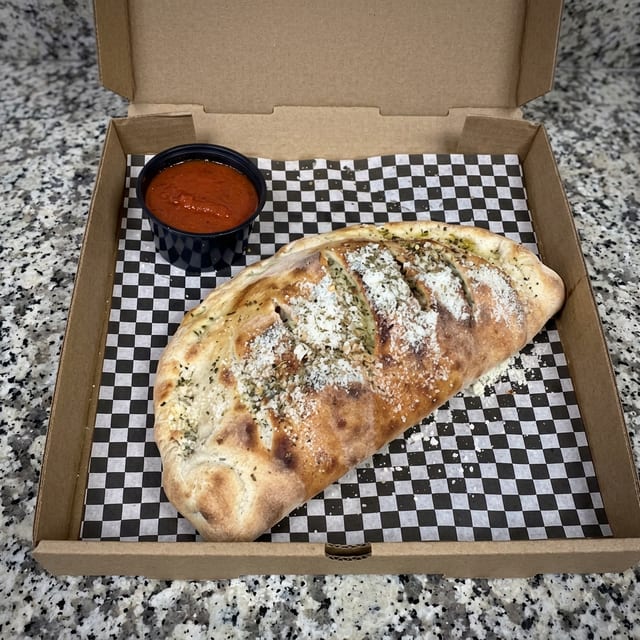 The Mighty Meaty Calzone.